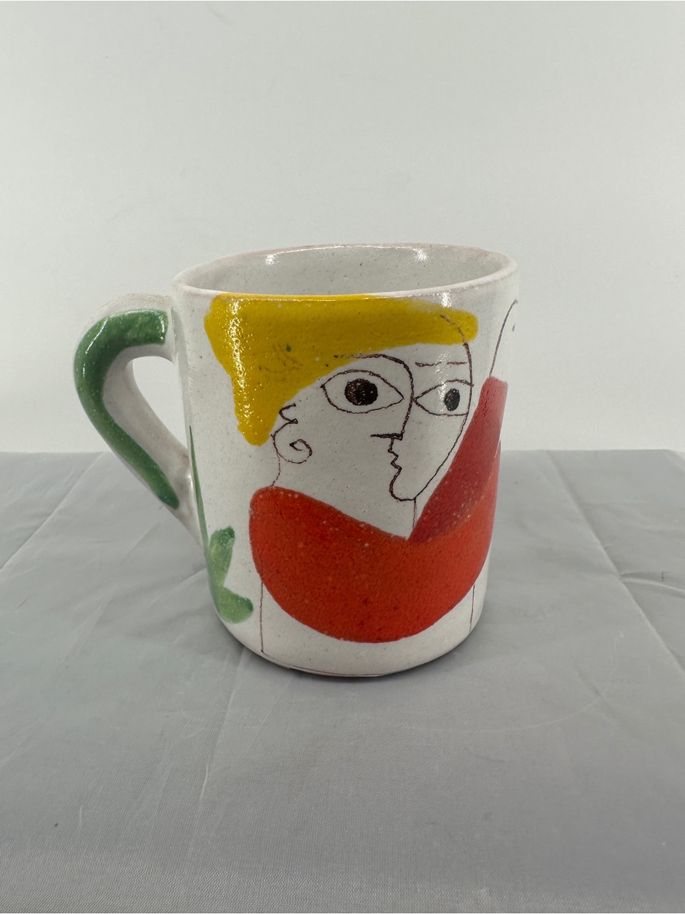 Vintage Giovanni Desimone
Pottery Mug Designer Italian
Pottery - man & grapes